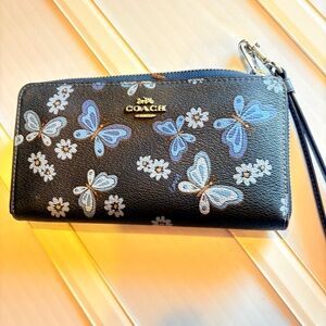 Coach zip around wallet leather with  Blue Butterflies. Like new condition